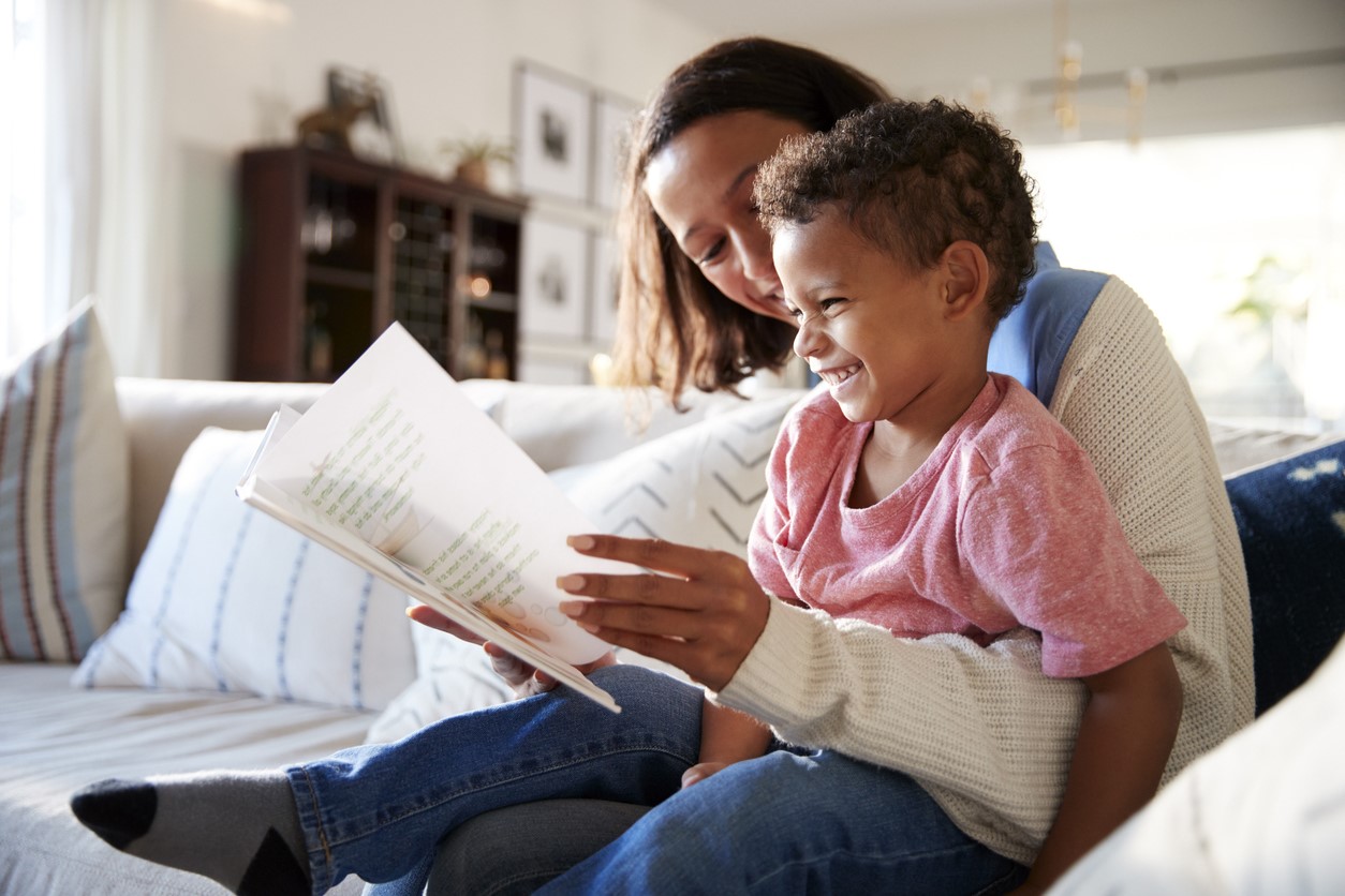 A child enjoying an illustrated story
